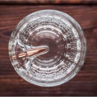 Граненый стакан с пулей 7.62 мм